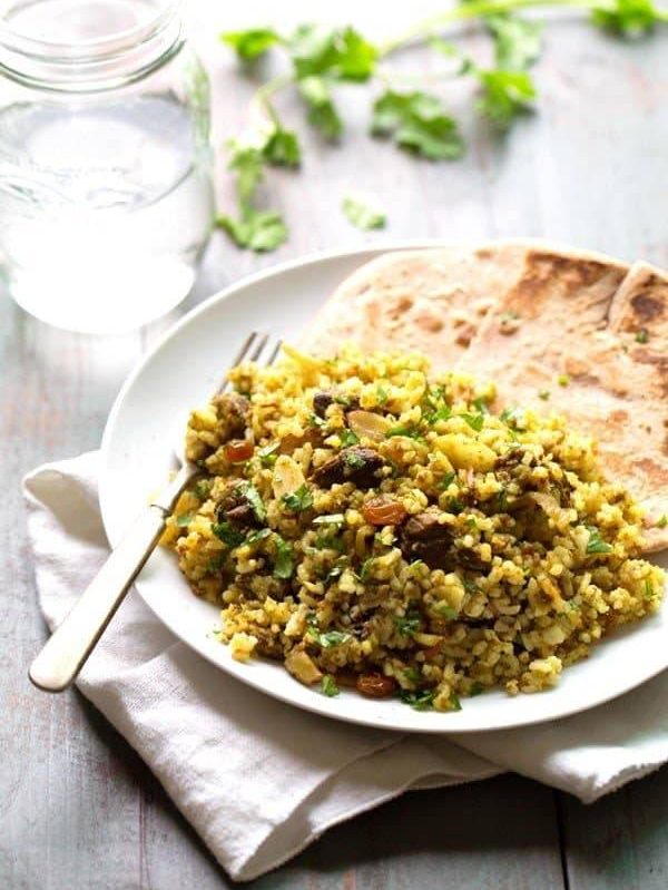 Beef Biryani - slivered almonds, golden raisins, saucy beef, warm spices, and fragrant basmati rice. ❤ le sigh. | pinchofyum.com