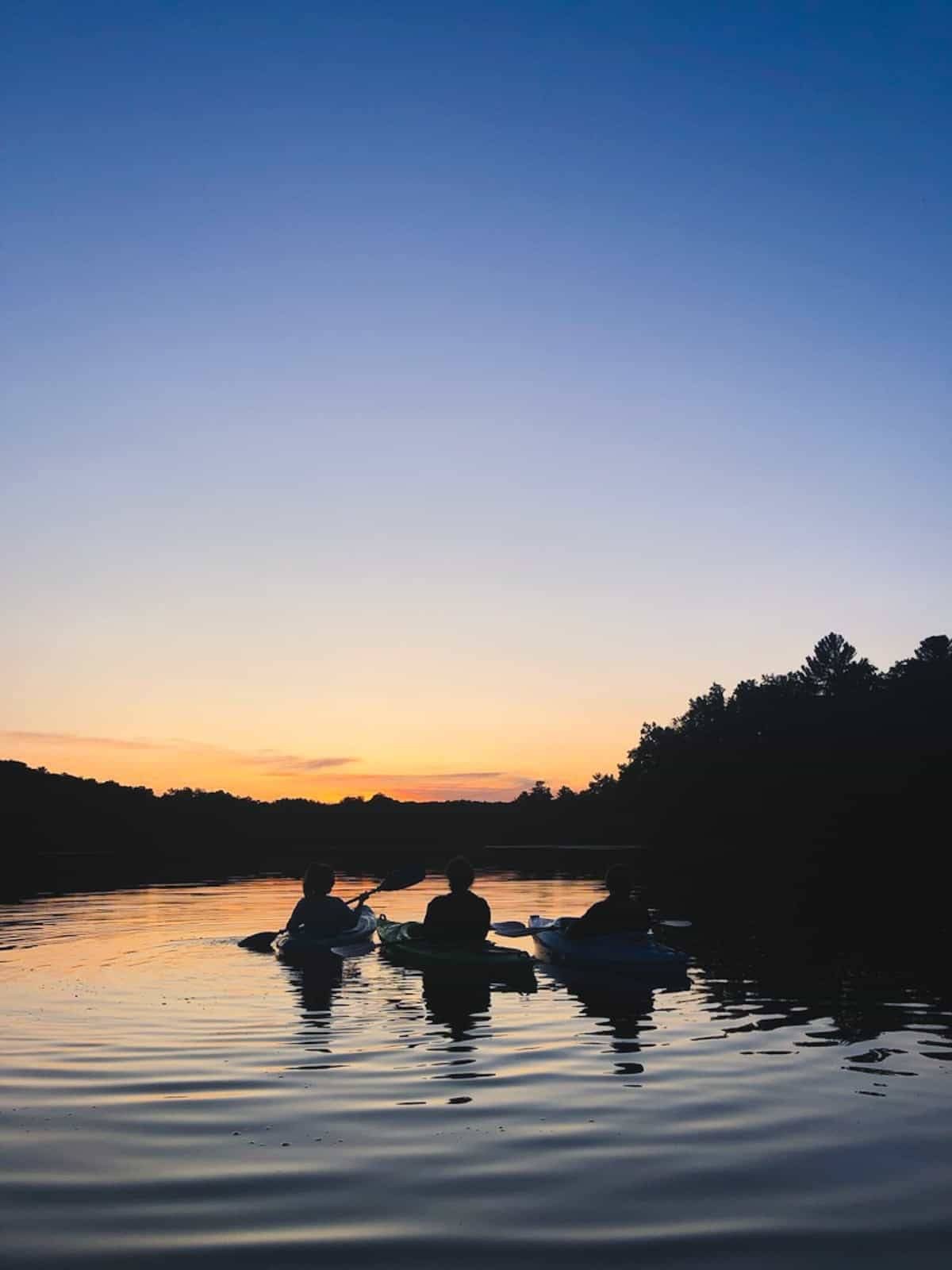 Kayaking at sunset.