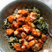 A picture of Crispy Buffalo Tofu with Caesar Salad