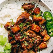 Pineapple pork with peppers and white rice.