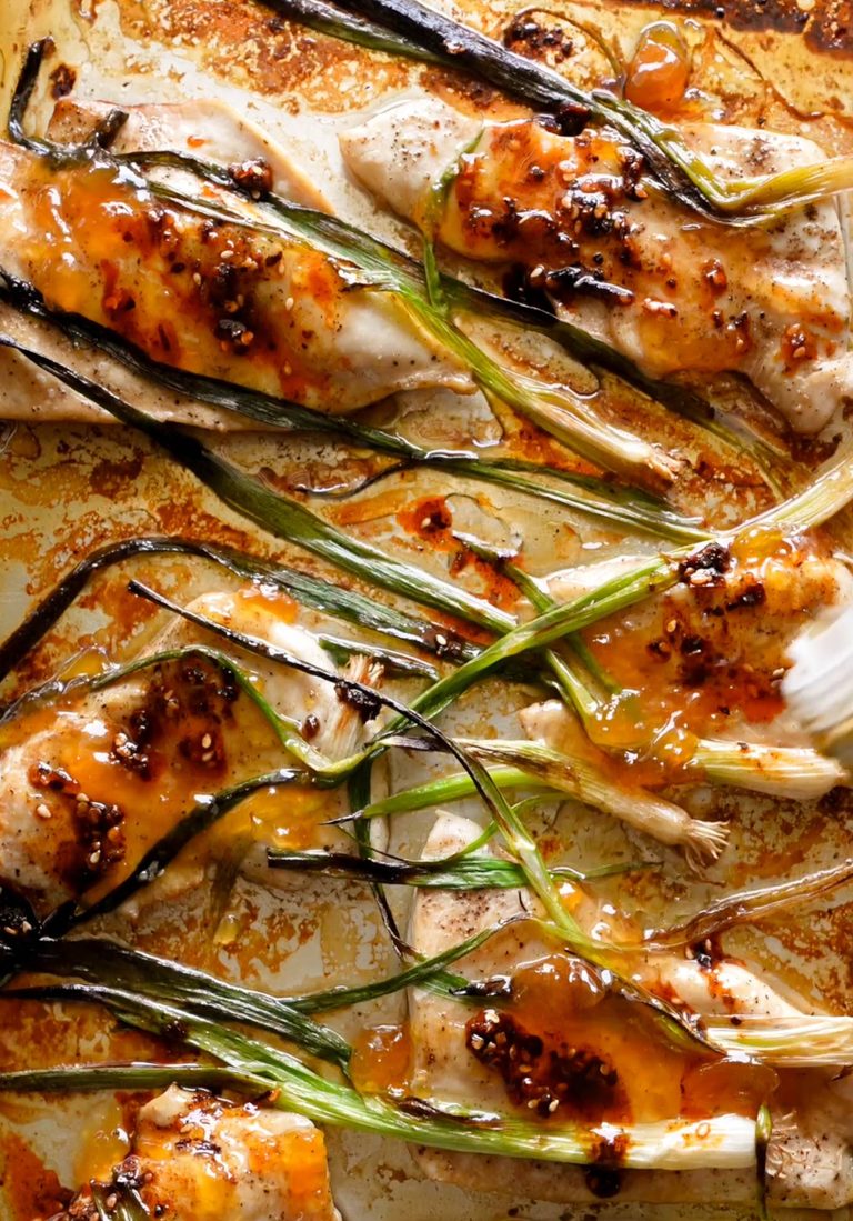 Apricot chicken on a sheet pan.