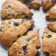 Bakery Style Blueberry Scones - crunchy sugaroutside, juicy blueberries + flaky tender inside. | pinchofyum.com