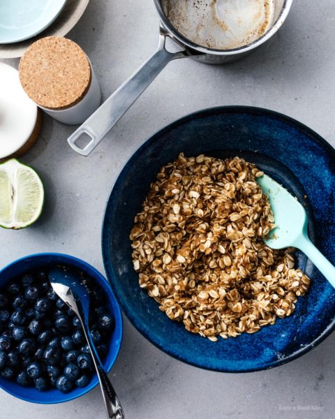 These browned butter blueberry oatmeal crumble bars are bursting with all the goodness of sweet summertime blueberries, nutty browned butter, and heart healthy oats. Make a batch today! #brownedbutter #brownbutter #recipes #dessert #oatbars #blueberrybars #blueberries #oatmeal