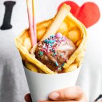 Make your own infinitely instagram friendly bubble waffle ice cream cones/puffle cones/eggloo egg waffle cones right at home. The batter comes together easily and you can fill your cones with ALL the things: ice cream, fruit, cookies, anything goes. #bubblewaffle #bubblewafflecones #hongkongbubblewaffles #pufflecone #eggloo #eggwaffle #recipes #dessertrecipes