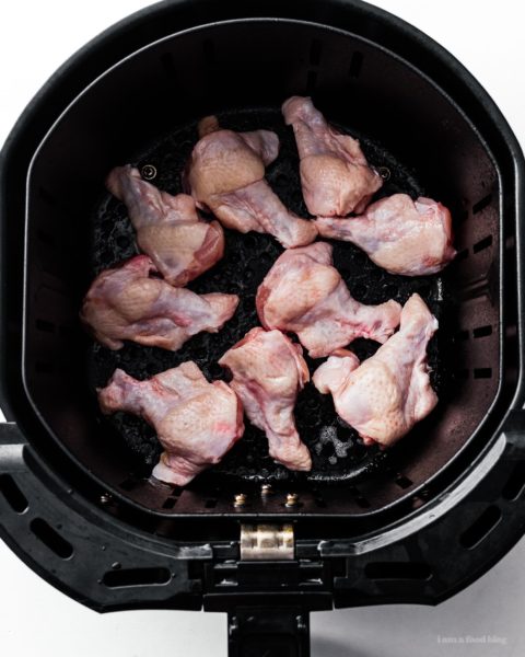 Air fryer chicken wings are so crispy and juicy you won’t believe they weren’t deep fried! Seriously good and so easy. Eat them naked, with salt and pepper, or toss them in a salty, sweet, sour Vietnamese fish sauce that will leave you begging for more. #airfryer #chickenwings #wings #airfryerwings #recipes #dinner #appies #vietnamesefood