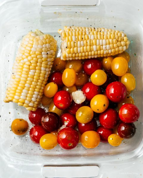 How to cook trader joe’s cauliflower gnocchi with sweet oven roasted tomatoes and corn with the best low carb gnocchi out there: cauliflower gnocchi. Super easy, light, tasty, and filling! #cauliflowergnocchi #traderjoes #cauliflowerrecipes #cauliflower #gnocchi #tomatoes #corn #recipes #dinnerrecipes #dinner