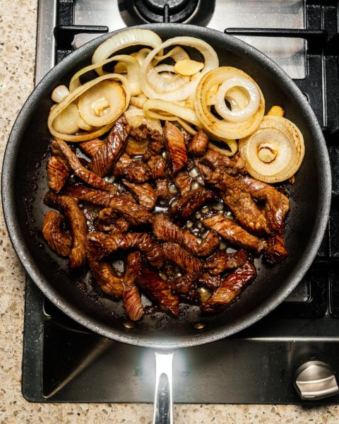 This super easy 7 ingredient ginger beef and onion stir fry is the answer to what’s for dinner tonight #stirfry #beefstirfry #dinner #recipes #quickandeasy #gingerbeef #betterthantakeout