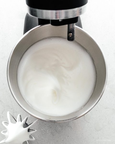 A super cute fluffy, jiggly Totoro cheesecake: pillowy soft, cotton-y, light-as-air cheesecake with just a hint of sweetness. #cheesecake #japanesecheesecake #fluffycheesecake #totorocake #totorocheesecake #totorofood #kawaiifood