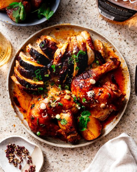 This 6 ingredient sheet pan dinner is your next weeknight rockstar: slightly spicy, slightly sweet Korean inspired chicken with creamy crispy roast potatoes #roastchicken #chicken #recipes #recipe #dinner #easy