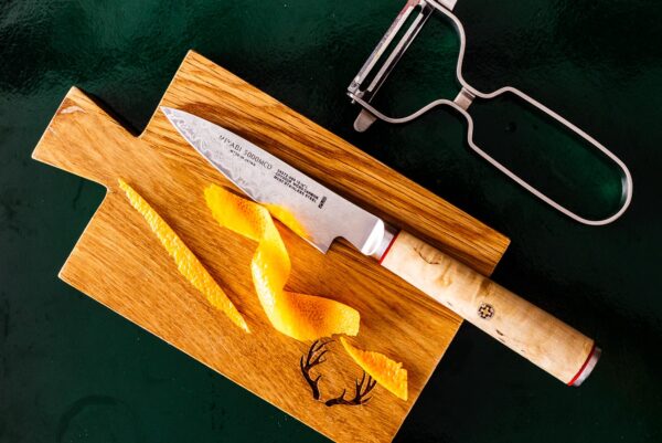 trimming orange peel garnish | www.iamafoodblog.com