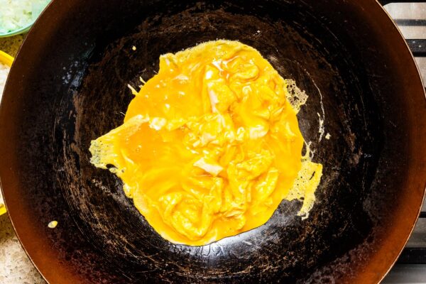 frying egg in a wok | www.iamafoodblog.com