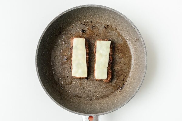 cooked burger dog patties with melted cheese | www.iamafoodblog.com