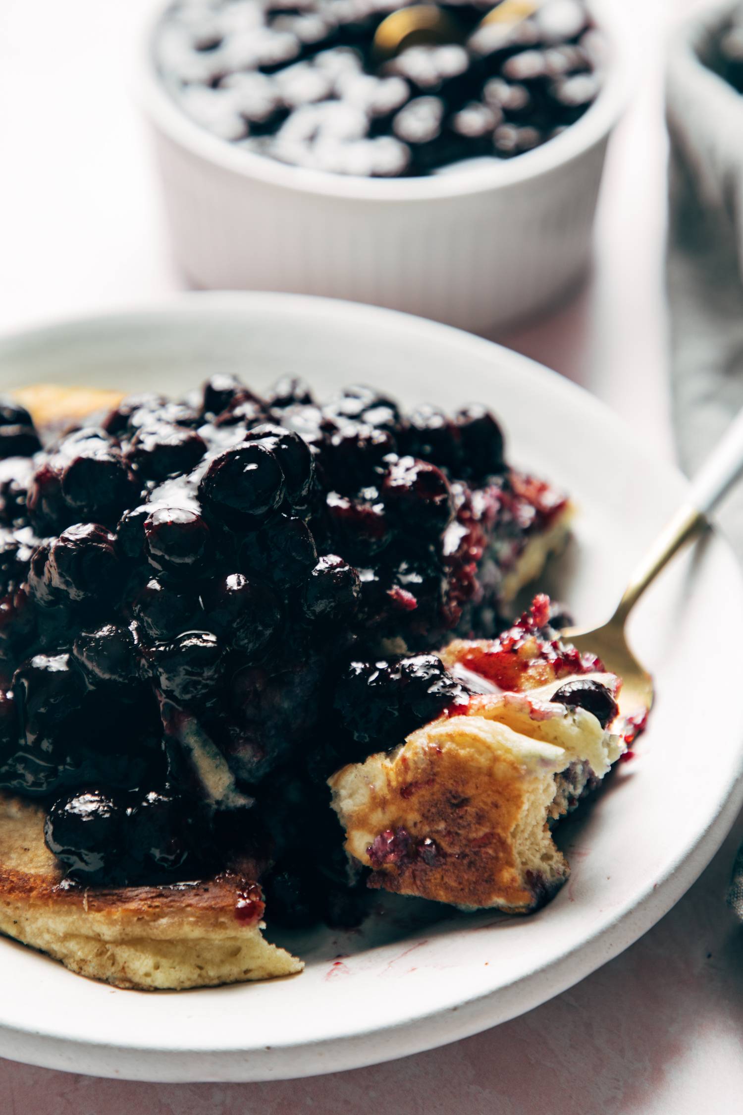 Homemade blueberry sauce on pancakes