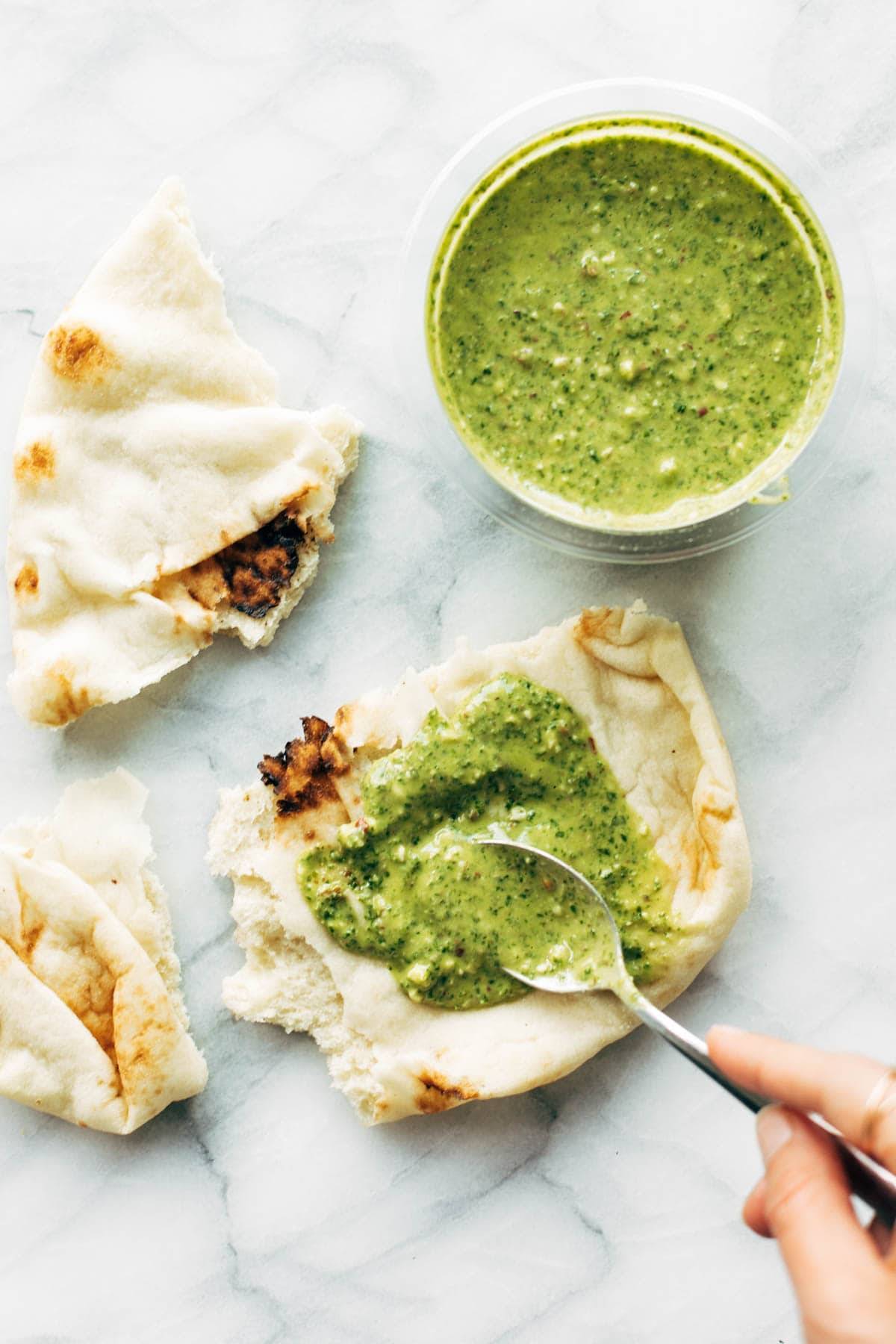 Spooned Kale Chimichurri on flatbread.