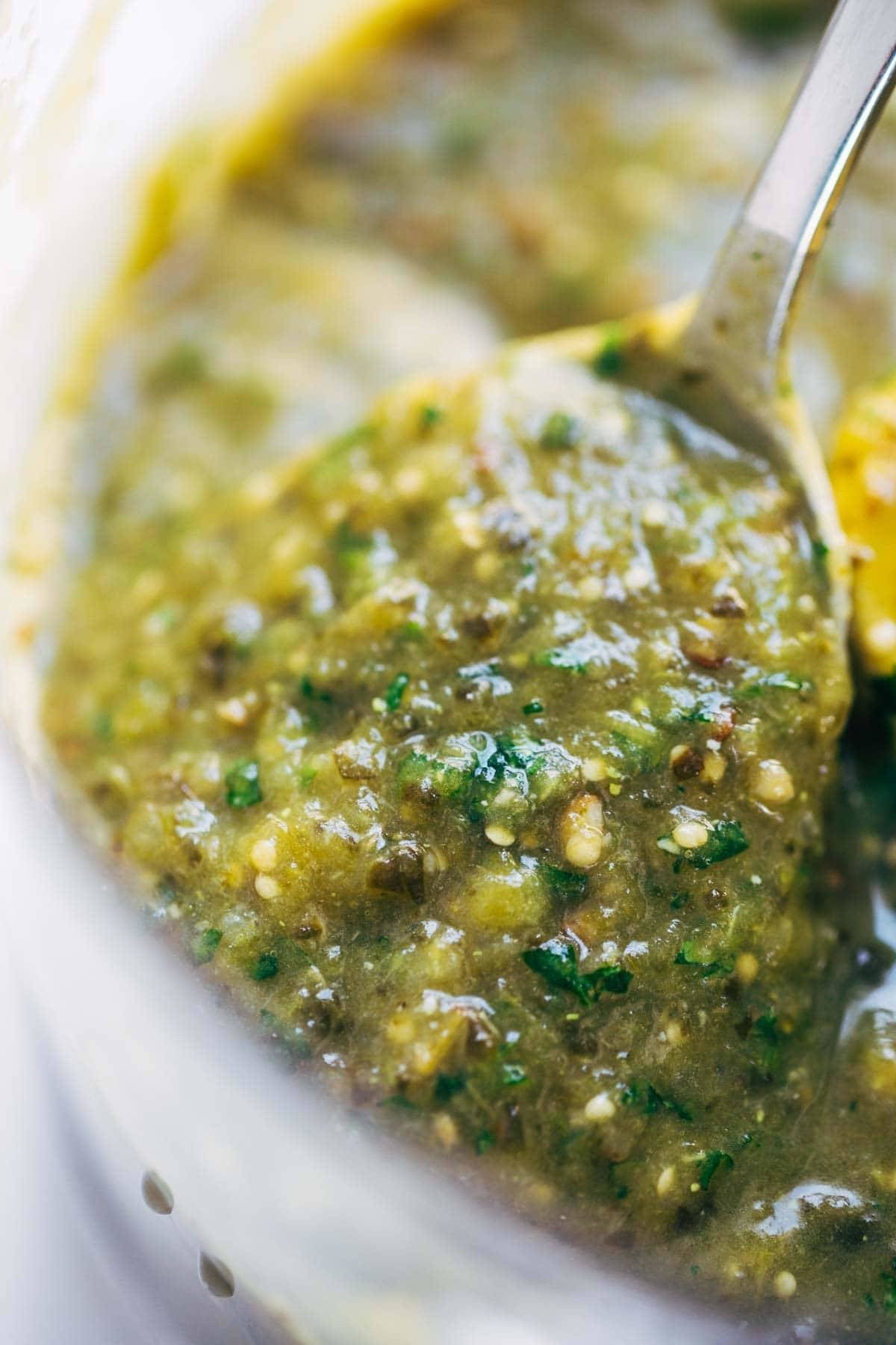 Cilantro sauce on a spoon.